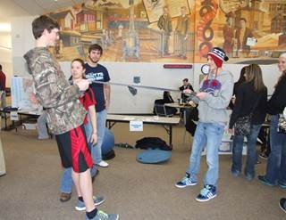 Ellis students participate in physical therapy demo.
