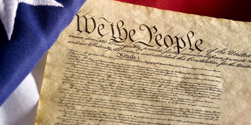 U.S. Constitution displayed on the American flag.
