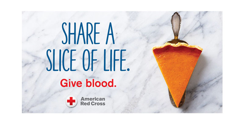 A slice of Pumpkin pie with the words "Share a slice of life. Give Blood."