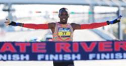 Wesley Banguria Kiptoo crossing the finish line in a race.